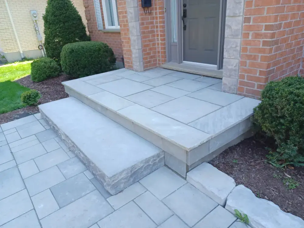 Square cut flagstone installed on the front porch