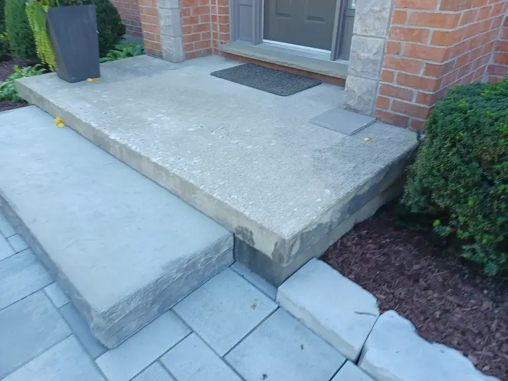 Existing concrete porch before installation
