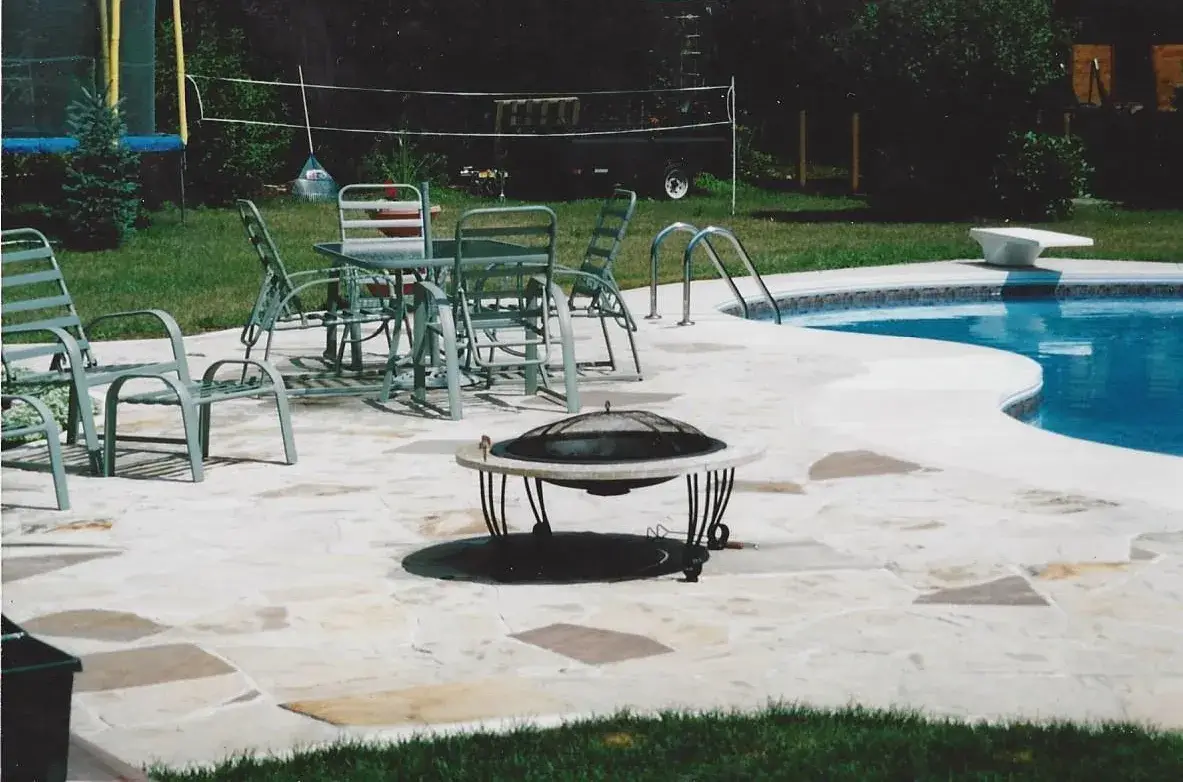 Pool deck and patio sitting area, flagstone in mortar on a concrete base