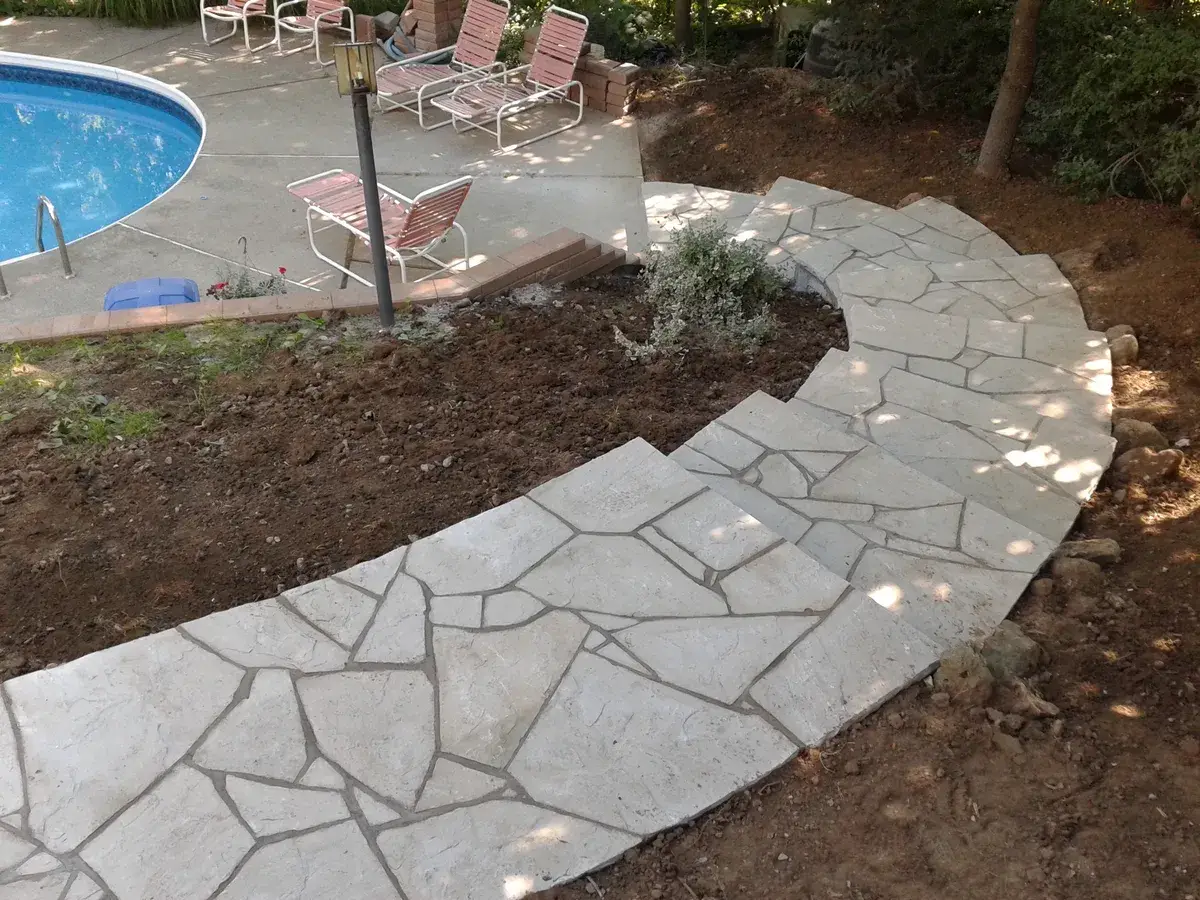 Stone stairs descending to a pool